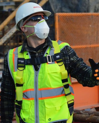 Engineer wearing H100 Single Point Harness on a construction site