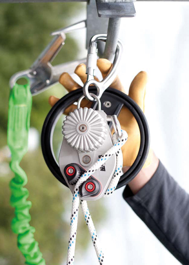 Close-up of a pulley system A SafEscape controlled rope descender device 